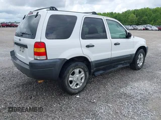2003 Ford Escape XLT Popular 2 с VIN 1FMYU93133KD21454, выставлен на аукционе IAAI как лот 42386150 с пробегом 182 849 миль миль и . История ставок и продаж доступна на DreamBid. Изображение 4.