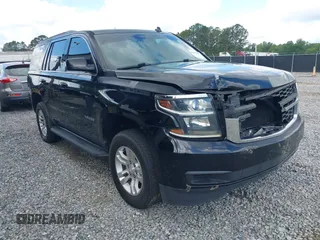 2015 Chevrolet Tahoe LS z VIN 1GNSCAKC5FR101933, wystawiony jako IAAI lot #42242415 z przebiegiem 185 191 mil mil oraz . Historia ofert i sprzedaży dostępna na DreamBid. Obrazek 1.