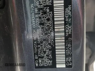 2008 Toyota Prius z VIN JTDKB20U383359984, wystawiony jako Copart lot #57209665 z przebiegiem 247 761 mil mil oraz Szkoda całkowita • Salvage title. Historia ofert i sprzedaży dostępna na DreamBid. Obrazek 12.