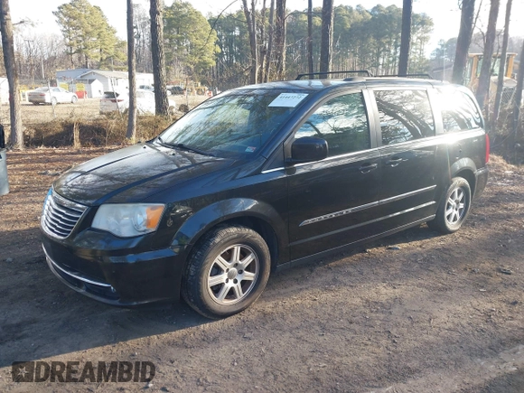 2012 Chrysler Town & Country Touring with VIN 2C4RC1BG0CR212650, listed as a IAAI auction lot 41447272 with 231,658 mi miles. Bid and sale history available at carsss.com. Image 2.