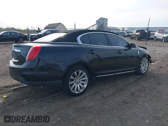 2012 Lincoln MKS with VIN 1LNHL9DR7CG800129, listed as a IAAI auction lot 41851280 with 144,992 mi miles. Bid and sale history available at carsss.com. Image 4.