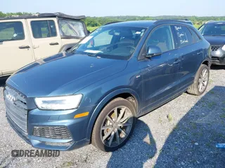 2018 Audi Q3 Premium Plus with VIN WA1JCCFS1JR007553, listed as a IAAI auction lot 41775321 with 81,665 mi miles and . Bid and sale history available at DreamBid. Image 2.