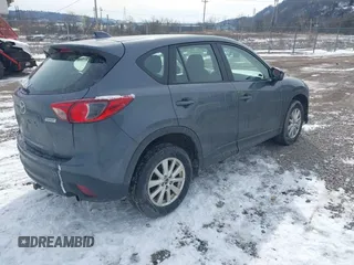 2013 Mazda CX-5 Sport z VIN JM3KE2BE9D0156274, wystawiony jako IAAI lot #41624466 z przebiegiem 159 017 mil mil oraz . Historia ofert i sprzedaży dostępna na DreamBid. Obrazek 4.