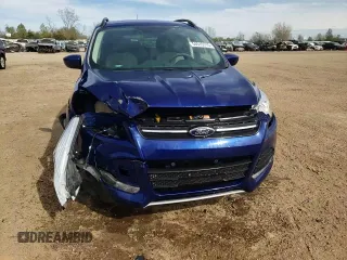 2016 Ford Escape SE z VIN 1FMCU0G99GUC07099, wystawiony jako Copart lot #54575115 z przebiegiem 86 623 mil mil oraz Szkoda całkowita • Salvage title. Historia ofert i sprzedaży dostępna na DreamBid. Obrazek 13.