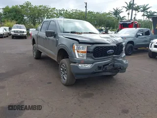 2021 Ford F-150 XL with VIN 1FTEW1EP0MFB94936, listed as a IAAI auction lot 41594393 with 57,033 mi miles. Bid and sale history available at carsss.com. Image 1.
