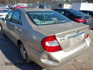 2002 Toyota Camry LE z VIN 4T1BE32K02U051709, wystawiony jako IAAI lot #41485620 z przebiegiem 232 876 mil mil oraz . Historia ofert i sprzedaży dostępna na DreamBid. Obrazek 3.