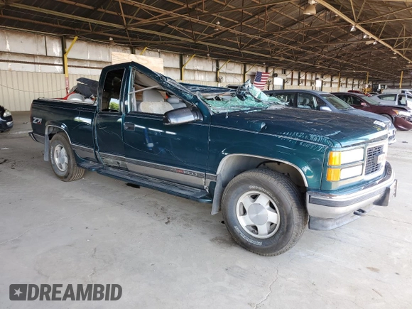 1997 GMC Sierra 1500 z VIN 2GTEK19RXV1501674, wystawiony jako Copart lot #59061595 z przebiegiem 138 998 mil mil oraz Szkoda całkowita • Salvage title. Historia ofert i sprzedaży dostępna na DreamBid. Obrazek 4.