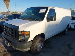 2011 Ford Econoline Cargo Commercial with VIN 1FTNE2EL2BDA71427, listed as a IAAI auction lot 41755582 with 157,531 mi miles. Bid and sale history available at carsss.com. Image 21.