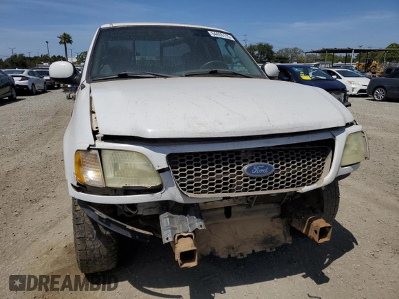 2003 Ford F-150 XL with VIN 2FTRX17213CA05950, listed as a Copart auction lot 54435115 with 310,503 mi miles and Salvage title. Bid and sale history available at DreamBid. Image 5.