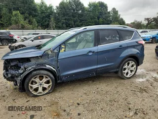 2018 Ford Escape Titanium with VIN 1FMCU0J98JUA07458, listed as a Copart auction lot 64450315 with 50,481 mi miles and Salvage title. Bid and sale history available at DreamBid. Image 1.