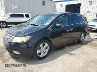 2011 Honda Odyssey Touring with VIN 5FNRL5H94BB078820, listed as a Copart auction lot 62656805 with 155,931 mi miles and Salvage title. Bid and sale history available at DreamBid. Image 1.