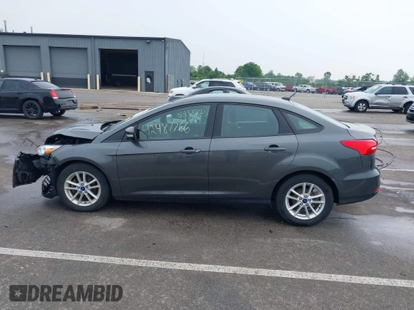 2017 Ford Focus SE with VIN 1FADP3F28HL235303, listed as a IAAI auction lot 42487766 with 92,187 mi miles and . Bid and sale history available at DreamBid. Image 14.