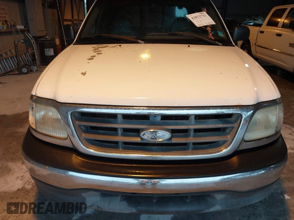 2002 Ford F-150 XL with VIN 1FTRX17L52NA38404, listed as a IAAI auction lot 41871731 with 366,564 mi miles. Bid and sale history available at carsss.com. Image 6.
