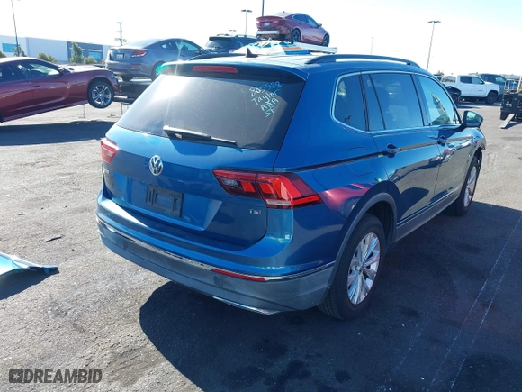 2018 Volkswagen Tiguan SEL with VIN 3VV3B7AX4JM001454, listed as a IAAI auction lot 41337213 with 82,624 mi miles. Bid and sale history available at carsss.com. Image 4.