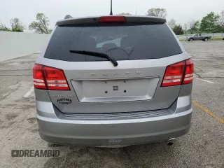 2017 Dodge Journey SE z VIN 3C4PDCAB2HT601316, wystawiony jako Copart lot #54153395 z przebiegiem 138 737 mil mil oraz Szkoda całkowita • Salvage title. Historia ofert i sprzedaży dostępna na DreamBid. Obrazek 6.