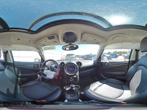 2016 MINI Countryman S with VIN WMWZC5C54GWT38489, listed as a Copart auction lot 63834335 with 102,564 mi miles and Salvage title. Bid and sale history available at DreamBid. Image 14.