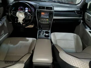 2015 Toyota Camry XLE with VIN 4T1BF1FK3FU077674, listed as a Copart auction lot 52679985 with 128,417 mi miles and Salvage Title. Bid and sale history available at DreamBid. Image 8.