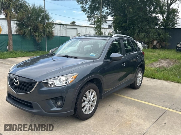 2013 Mazda CX-5 Sport with VIN JM3KE4BE7D0141588, listed as a Copart auction lot 66138585 with 124,920 mi miles and Clean title. Bid and sale history available at DreamBid. Image 2.