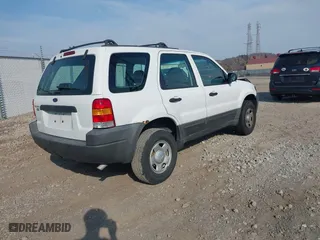 2003 Ford Escape XLS Popular with VIN 1FMYU92183KB46619, listed as a IAAI auction lot 40695244 with 0 mi miles. Bid and sale history available at carsss.com. Image 4.