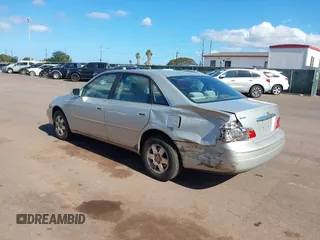 2003 Toyota Avalon XL z VIN 4T1BF28B93U274928, wystawiony jako IAAI lot #42034461 z przebiegiem 150 549 mil mil oraz . Historia ofert i sprzedaży dostępna na DreamBid. Obrazek 3.