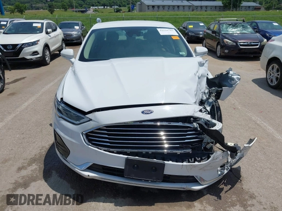2020 Ford Fusion SEL with VIN 3FA6P0CD3LR152711, listed as a IAAI auction lot 42516763 with 97,073 mi miles and . Bid and sale history available at DreamBid. Image 12.
