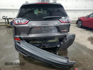 2019 Jeep Cherokee Trailhawk Elite with VIN 1C4PJMBNXKD182846, listed as a Copart auction lot 84090984 with 79,212 mi miles and Salvage title. Bid and sale history available at DreamBid. Image 6.