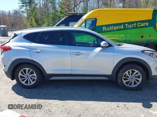 2018 Hyundai Tucson SEL with VIN KM8J3CA42JU771483, listed as a IAAI auction lot 42159936 with 91,604 mi miles and . Bid and sale history available at DreamBid. Image 14.