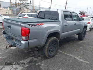 2017 Toyota Tacoma SR5 with VIN 3TMCZ5AN5HM060763, listed as a IAAI auction lot 41783899 with 93,926 mi miles. Bid and sale history available at carsss.com. Image 4.