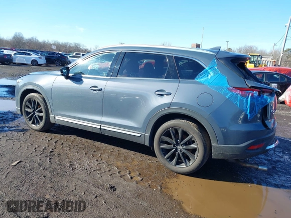 2021 Mazda CX-9 Grand Touring with VIN JM3TCBDY5M0506632, listed as a IAAI auction lot 41589264 with 50,026 mi miles and . Bid and sale history available at carsss.com. Image 3.