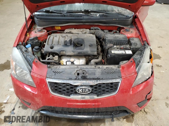 2010 Kia Rio with VIN KNADH4B39A6691792, listed as a Copart auction lot 80043064 with 161,139 mi miles and Salvage Title. Bid and sale history available at DreamBid. Image 11.