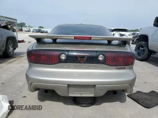 2001 Pontiac Firebird Formula z VIN 2G2FV22G912123611, wystawiony jako Copart lot #56820064 z przebiegiem 55 319 mil mil oraz Szkody całkowita. Historia ofert i sprzedaży dostępna na DreamBid. Obrazek 6.