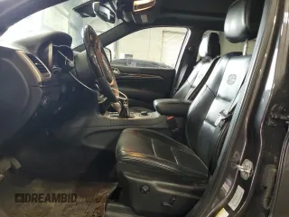 2016 Jeep Grand Cherokee Overland with VIN 1C4RJFCG9GC345309, listed as a Copart auction lot 61095285 with 115,968 mi miles and Salvage title. Bid and sale history available at DreamBid. Image 7.