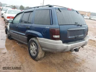1999 Jeep Grand Cherokee Laredo with VIN 1J4GW58N3XC760274, listed as a IAAI auction lot 41541029 with 1 mi miles. Bid and sale history available at carsss.com. Image 3.