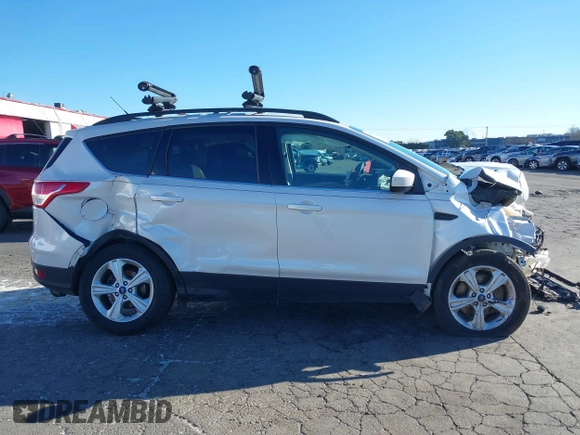 2016 Ford Escape SE with VIN 1FMCU9GX2GUB29249, listed as a IAAI auction lot 41545211 with 97,631 mi miles. Bid and sale history available at carsss.com. Image 14.