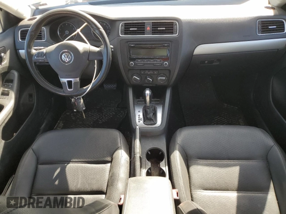 2013 Volkswagen Jetta SE with VIN 3VWDX7AJ0DM269550, listed as a Copart auction lot 74886184 with 130,181 mi miles and Salvage title. Bid and sale history available at DreamBid. Image 8.