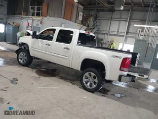 2012 GMC Sierra 1500 SLE with VIN 3GTP2VE72CG171022, listed as a IAAI auction lot 41619901 with 99,291 mi miles. Bid and sale history available at carsss.com. Image 3.