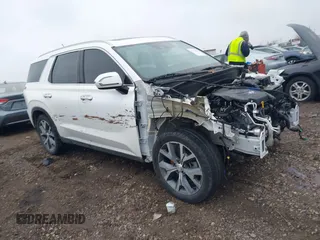 2021 Hyundai Palisade SEL z VIN KM8R3DHE9MU309742, wystawiony jako IAAI lot #41132184 z przebiegiem 53 716 mil mil oraz . Historia ofert i sprzedaży dostępna na DreamBid. Obrazek 1.