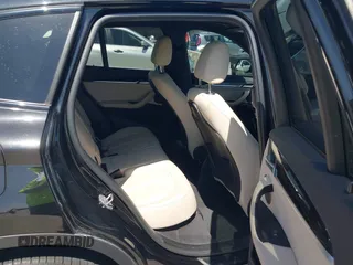 2021 BMW X1 sDrive28i with VIN WBXJG7C07M3M65841, listed as a IAAI auction lot 41877032 with 79,817 mi miles and . Bid and sale history available at DreamBid. Image 8.