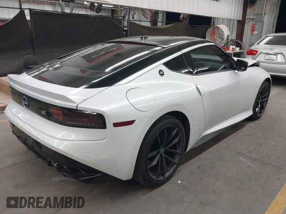 2024 Nissan Z Performance with VIN JN1BZ4BH9RM364239, listed as a IAAI auction lot 41860174 with 7,501 mi miles and . Bid and sale history available at DreamBid. Image 4.