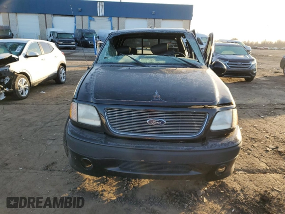 2001 Ford F-150 SuperCrew XLT with VIN 1FTRW07L71KA04123, listed as a Copart auction lot 48477755 with 128,808 mi miles and Clean Title. Bid and sale history available at carsss.com. Image 5.