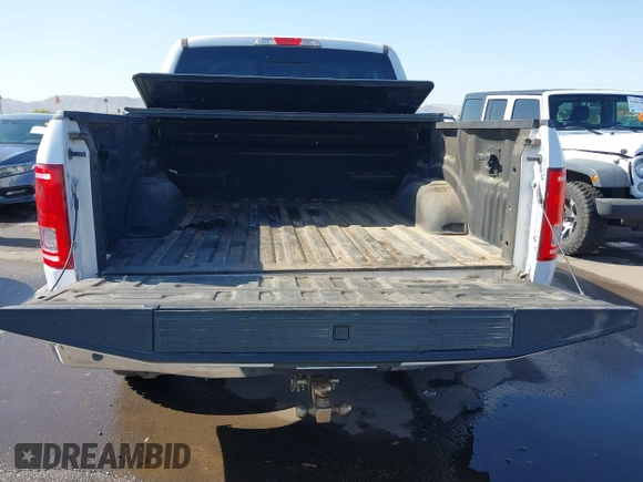 2015 Ford F-150 XLT with VIN 1FTEW1EP0FKE42273, listed as a IAAI auction lot 41988265 with 119,483 mi miles. Bid and sale history available at carsss.com. Image 16.