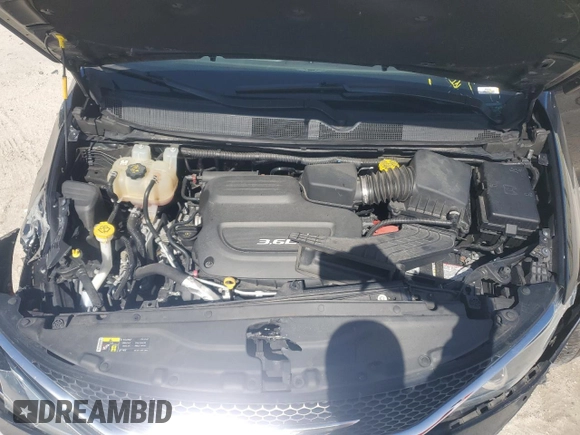 2017 Chrysler Pacifica Touring L with VIN 2C4RC1BG7HR551641, listed as a Copart auction lot 51810185 with 66,860 mi miles and Salvage Title. Bid and sale history available at DreamBid. Image 13.