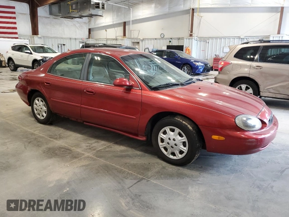 1999 Mercury Sable GS with VIN 1MEFM50U8XG639290, listed as a Copart auction lot 63098155 with 180,082 mi miles and Clean title. Bid and sale history available at DreamBid. Image 4.