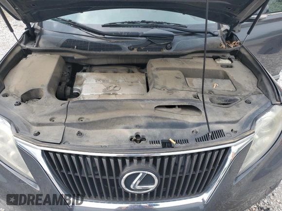 2010 Lexus RX 350 z VIN 2T2BK1BA8AC046998, wystawiony jako Copart lot #57472235 z przebiegiem 186 783 mil mil oraz Szkoda całkowita • Salvage title. Historia ofert i sprzedaży dostępna na DreamBid. Obrazek 12.