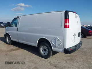 2014 Chevrolet Express Cargo Van with VIN 1GCWGFCAXE1206912, listed as a IAAI auction lot 41700273 with 177,348 mi miles. Bid and sale history available at carsss.com. Image 3.