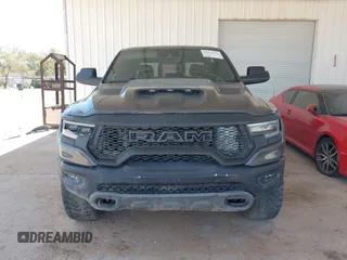 2022 Ram 1500 TRX with VIN 1C6SRFU97NN353587, listed as a IAAI auction lot 42174702 with 35,305 mi miles and . Bid and sale history available at DreamBid. Image 13.