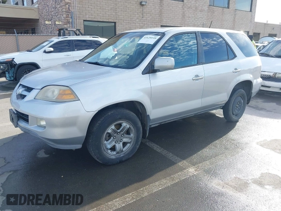 2004 Acura MDX with VIN 2HNYD18294H545516, listed as a IAAI auction lot 41620110 with 220,246 mi miles. Bid and sale history available at carsss.com. Image 19.