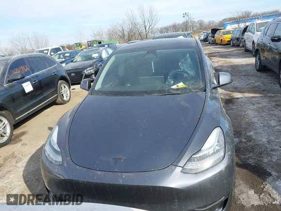 2022 Tesla Model Y Long Range z VIN 7SAYGDEE6NA013757, wystawiony jako IAAI lot #41364867 z przebiegiem 33 621 mil mil oraz . Historia ofert i sprzedaży dostępna na DreamBid. Obrazek 13.