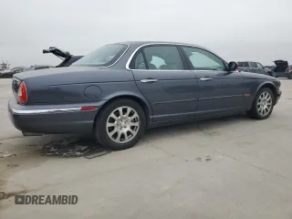 2004 Jaguar XJ with VIN SAJWA71C04SG22878, listed as a Copart auction lot 44383205 with 127,515 mi miles and Clean Title. Bid and sale history available at carsss.com. Image 3.