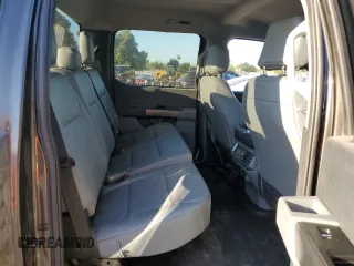 2023 Ford F-150 Lightning Pro with VIN 1FTVW1EL7PWG11261, listed as a Copart auction lot 64088925 with 3,288 mi miles and Salvage title. Bid and sale history available at DreamBid. Image 10.